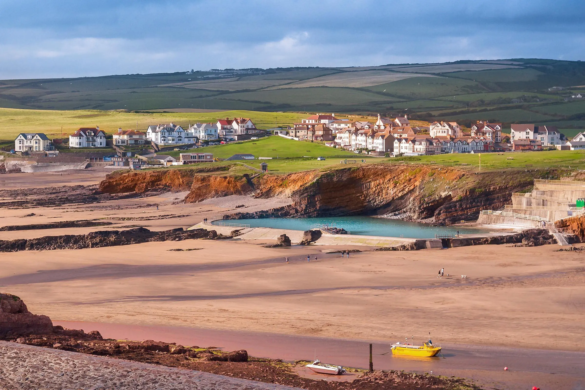 Bude beach and dramatic red sandstone cliffs, 4 miles from Little Pig, North Cornwall